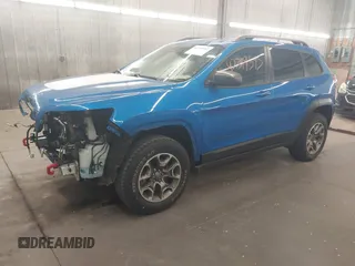 2020 Jeep Cherokee Trailhawk with VIN 1C4PJMBX6LD656570, listed as a IAAI auction lot 42399597 with 88,348 mi miles and . Bid and sale history available at DreamBid. Image 18.