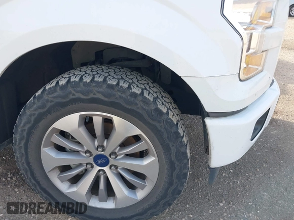 2017 Ford F-150 XL with VIN 1FTEW1EP8HKD07013, listed as a IAAI auction lot 42619279 with 103,750 mi miles and . Bid and sale history available at DreamBid. Image 6.