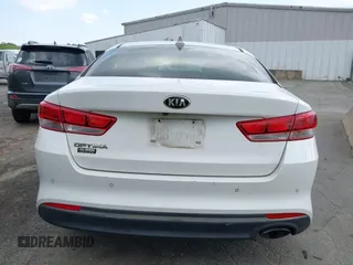 2018 Kia Optima LX with VIN 5XXGT4L30JG256660, listed as a IAAI auction lot 42005531 with 100,337 mi miles and . Bid and sale history available at DreamBid. Image 15.