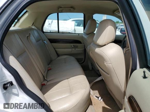 2008 Mercury Grand Marquis LS z VIN 2MEFM75V68X649535, wystawiony jako Copart lot #53817595 z przebiegiem 138 898 mil mil oraz Szkody całkowita. Historia ofert i sprzedaży dostępna na DreamBid. Obrazek 10.