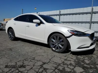 2021 Mazda 6 Touring with VIN JM1GL1VM0M1612027, listed as a Copart auction lot 48262185 with 67,568 mi miles and Salvage Title. Bid and sale history available at DreamBid. Image 4.