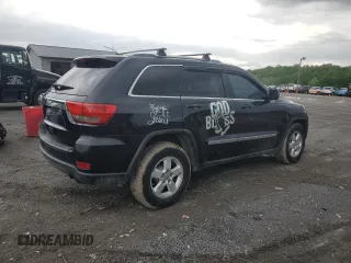 2011 Jeep Grand Cherokee Laredo z VIN 1J4RR4GG5BC609569, wystawiony jako Copart lot #55701055 z przebiegiem 234 116 mil mil oraz Czysty tytuł • Clean title. Historia ofert i sprzedaży dostępna na DreamBid. Obrazek 3.