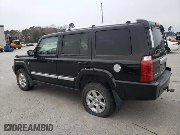 2007 Jeep Commander Overland with VIN 1J8HG68247C557731, listed as a Copart auction lot 87964795 with 174,195 mi miles and Salvage title. Bid and sale history available at DreamBid. Image 2.