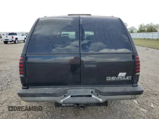 1999 Chevrolet Suburban with VIN 3GNEC16R7XG141671, listed as a Copart auction lot 77784174 with 207,234 mi miles and Salvage Title. Bid and sale history available at carsss.com. Image 6.