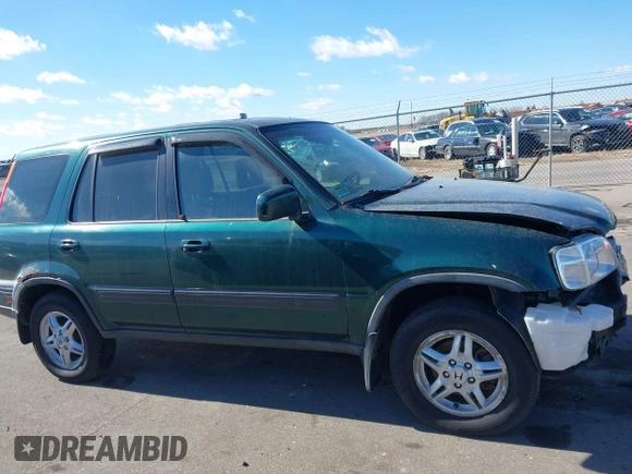 2000 Honda CR-V EX with VIN JHLRD176XYC035377, listed as a IAAI auction lot 41694054 with 196,985 mi miles. Bid and sale history available at carsss.com. Image 14.