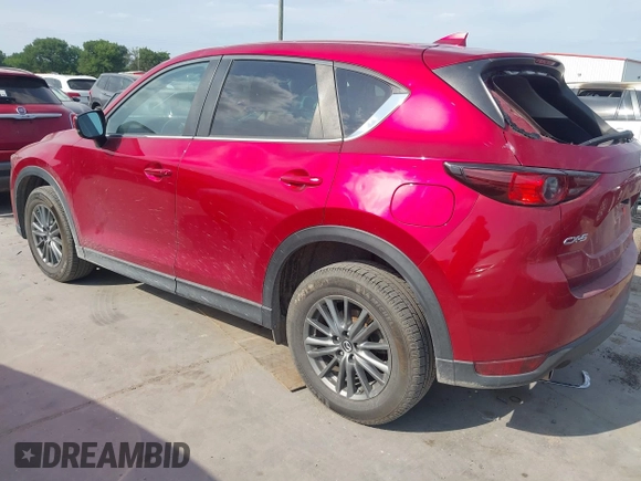 2017 Mazda CX-5 Touring with VIN JM3KFACL3H0195212, listed as a IAAI auction lot 42041361 with 57,377 mi miles and . Bid and sale history available at carsss.com. Image 3.