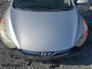 2013 Hyundai Elantra Limited PZEV with VIN 5NPDH4AE3DH269890, listed as a Copart auction lot 52039115 with 196,215 mi miles and Salvage Title. Bid and sale history available at carsss.com. Image 11.