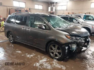 2015 Toyota Sienna SE with VIN 5TDXK3DC8FS554651, listed as a IAAI auction lot 41722659 with 158,418 mi miles. Bid and sale history available at carsss.com. Image 1.