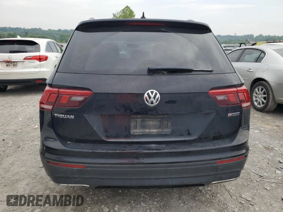 2021 Volkswagen Tiguan S z VIN 3VV0B7AX6MM023026, wystawiony jako Copart lot #60134345 z przebiegiem 98 196 mil mil oraz Szkoda całkowita • Salvage title. Historia ofert i sprzedaży dostępna na DreamBid. Obrazek 6.