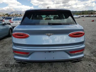 2022 Bentley Bentayga V8 z VIN SJAAM2ZV9NC016403, wystawiony jako Copart lot #51584975 z przebiegiem 4 462 mil mil oraz Szkoda całkowita • Salvage title. Historia ofert i sprzedaży dostępna na DreamBid. Obrazek 6.