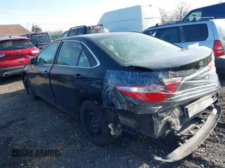 2016 Toyota Camry XLE with VIN 4T4BF1FKXGR549361, listed as a IAAI auction lot 41946584 with 221,775 mi miles and . Bid and sale history available at DreamBid. Image 3.