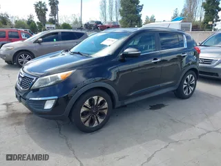 2011 Kia Sportage SX with VIN KNDPC3A69B7149771, listed as a IAAI auction lot 42012102 with 125,157 mi miles. Bid and sale history available at carsss.com. Image 2.