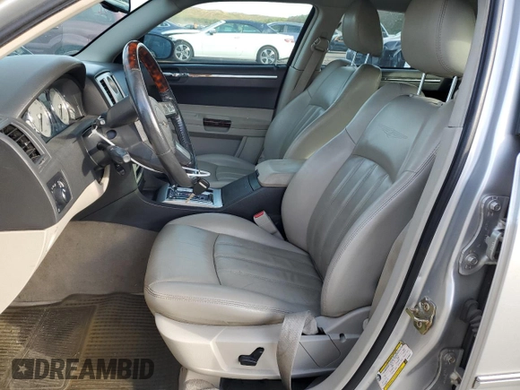 2006 Chrysler 300 C with VIN 2C3KK63H46H296625, listed as a Copart auction lot 70220974 with 104,811 mi miles and Salvage Title. Bid and sale history available at carsss.com. Image 7.