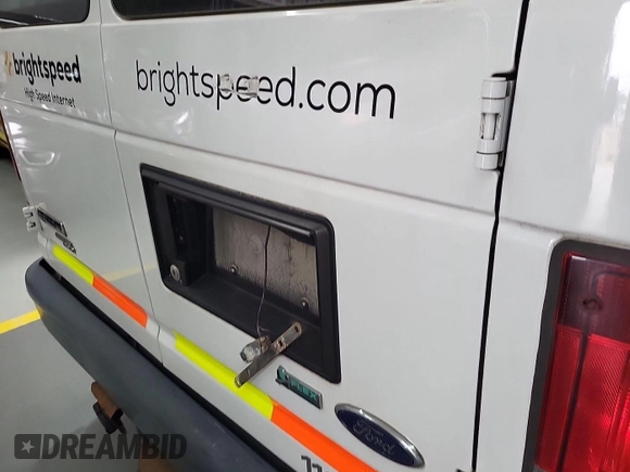 2013 Ford Econoline Cargo Commercial with VIN 1FTNE1EW6DDB01438, listed as a IAAI auction lot 42737683 with 125,160 mi miles and . Bid and sale history available at DreamBid. Image 32.