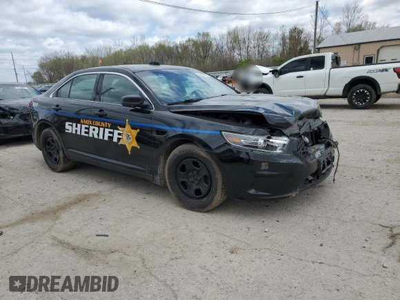 2015 Ford Police Interceptor with VIN 1FAHP2MK7FG159819, listed as a Copart auction lot 53123975 with 136,518 mi miles and Salvage title. Bid and sale history available at DreamBid. Image 4.