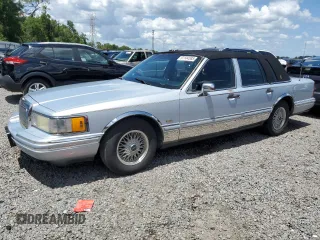 1994 Lincoln Town Car Executive with VIN 1LNLM81W9RY619385, listed as a Copart auction lot 61144585 with 104,574 mi miles and Non repairable. Bid and sale history available at DreamBid. Image 1.