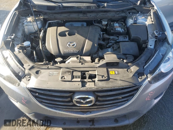 2016 Mazda CX-5 Sport with VIN JM3KE2BEXG0904597, listed as a Copart auction lot 86293834 with 63,343 mi miles and Salvage Title. Bid and sale history available at carsss.com. Image 12.