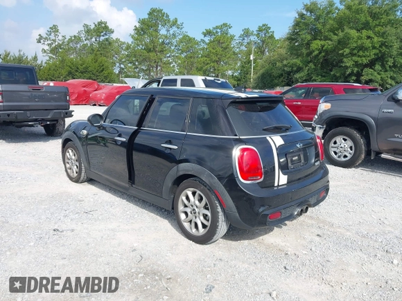 2016 MINI Hardtop 4 Door S z VIN WMWXU3C53G2D30807, wystawiony jako IAAI lot #42545577 z przebiegiem 86 952 mil mil oraz . Historia ofert i sprzedaży dostępna na DreamBid. Obrazek 3.