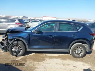 2017 Mazda CX-5 Touring with VIN JM3KFACL1H0192549, listed as a IAAI auction lot 41667781 with 89,030 mi miles. Bid and sale history available at carsss.com. Image 14.