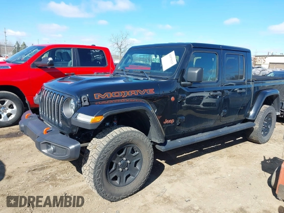 2021 Jeep Gladiator Mojave with VIN 1C6JJTEG9ML528964, listed as a IAAI auction lot 41879113 with 74,315 mi miles and . Bid and sale history available at DreamBid. Image 20.