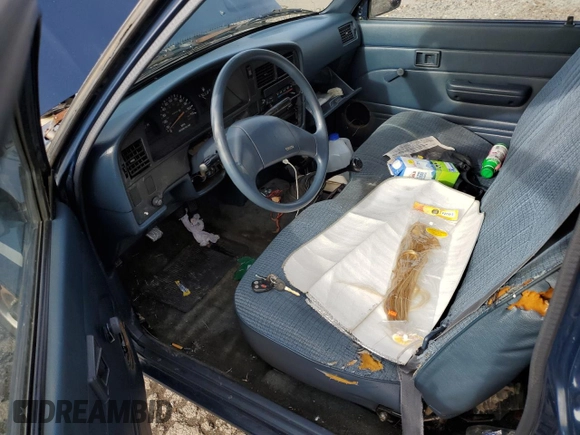 1990 Toyota Pickup DX с VIN JT4RN81P7L5065454, выставлен на аукционе Copart как лот 52913465 с пробегом 366 591 миль миль и Списание • Salvage title. История ставок и продаж доступна на DreamBid. Изображение 8.