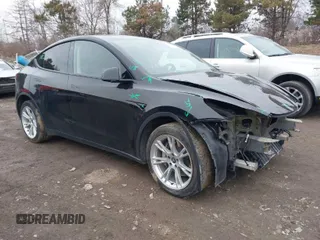2021 Tesla Model Y Standard Range with VIN 5YJYGDED5MF110941, listed as a IAAI auction lot 41538640 with 50,847 mi miles. Bid and sale history available at carsss.com. Image 1.