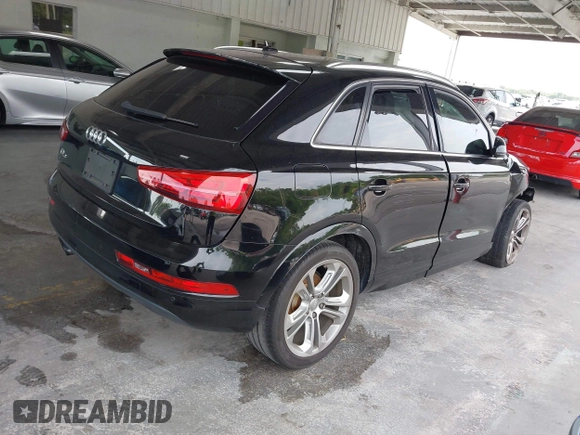 2017 Audi Q3 Premium Plus with VIN WA1HCCFS1HR013054, listed as a IAAI auction lot 42359261 with 148,435 mi miles and . Bid and sale history available at DreamBid. Image 4.