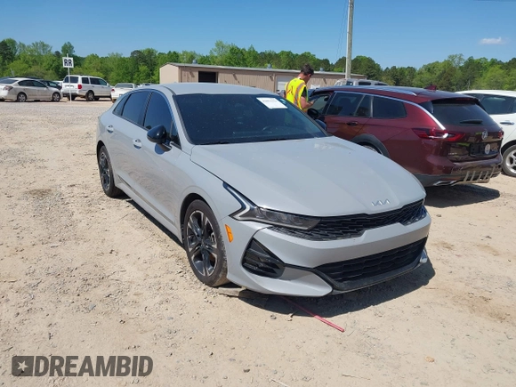 2022 Kia K5 GT-Line z VIN 5XXG64J23NG156401, wystawiony jako IAAI lot #42051123 z przebiegiem 71 853 mil mil oraz . Historia ofert i sprzedaży dostępna na DreamBid. Obrazek 1.