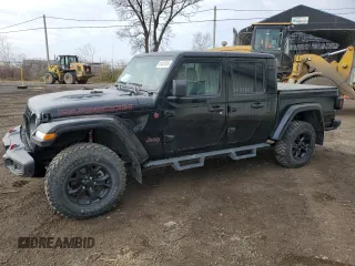 2022 Jeep Gladiator Rubicon z VIN 1C6JJTBG6NL118998, wystawiony jako Copart lot #81451814 z przebiegiem 61 125 mil mil oraz Szkoda całkowita • Salvage title. Historia ofert i sprzedaży dostępna na DreamBid. Obrazek 1.