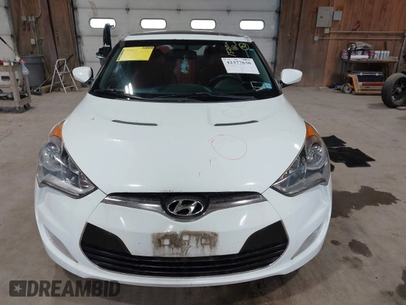 2012 Hyundai Veloster w/Black Int with VIN KMHTC6AD3CU080878, listed as a IAAI auction lot 42377636 with 152,430 mi miles and . Bid and sale history available at DreamBid. Image 12.