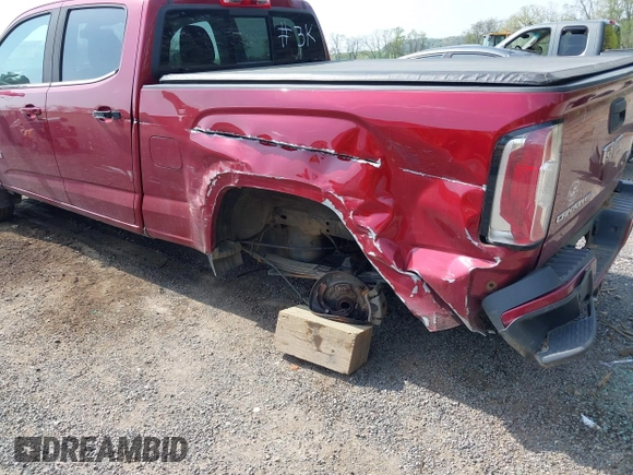 2019 GMC Canyon 4WD All Terrain z VIN 1GTG6FEN1K1290802, wystawiony jako IAAI lot #42150541 z przebiegiem 41 296 mil mil oraz . Historia ofert i sprzedaży dostępna na DreamBid. Obrazek 6.