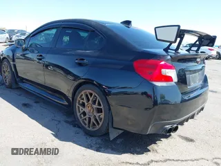 2015 Subaru WRX Limited with VIN JF1VA1G67F8809515, listed as a IAAI auction lot 42003173 with 112,414 mi miles. Bid and sale history available at carsss.com. Image 3.