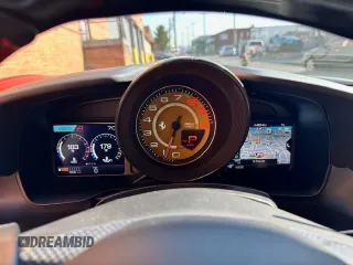 2021 Ferrari F8 с VIN ZFF93LMA2M0264413, выставлен на аукционе Copart как лот 54799515 с пробегом 1 205 миль миль и Списание • Salvage title. История ставок и продаж доступна на DreamBid. Изображение 11.