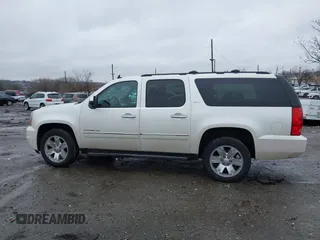 2012 GMC Yukon XL SLT with VIN 1GKS2KE77CR205341, listed as a IAAI auction lot 41565367 with 165,500 mi miles. Bid and sale history available at carsss.com. Image 14.