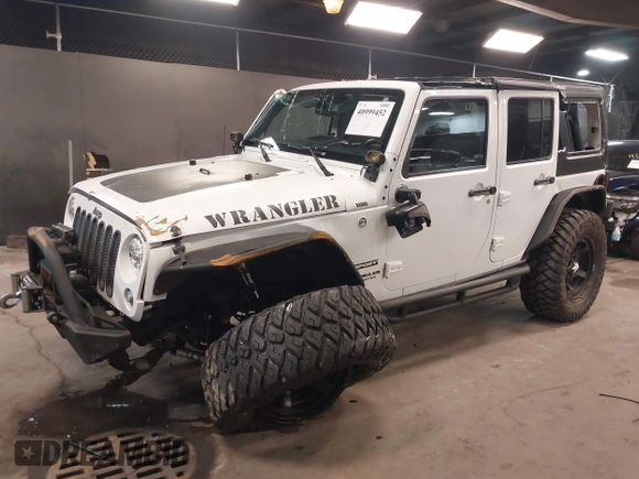2017 Jeep Wrangler Unlimited Sport with VIN 1C4BJWDG9HL565213, listed as a IAAI auction lot 40999452 with 50,586 mi miles. Bid and sale history available at carsss.com. Image 2.