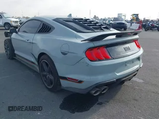 2023 Ford Mustang Mach 1 with VIN 1FA6P8R02P5502244, listed as a IAAI auction lot 41409445 with 12,573 mi miles and . Bid and sale history available at DreamBid. Image 3.