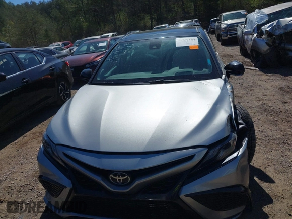2022 Toyota Camry TRD with VIN 4T1KZ1AK8NU061810, listed as a IAAI auction lot 41769584 with 79,709 mi miles and . Bid and sale history available at DreamBid. Image 12.
