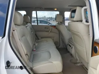 2012 Infiniti QX56 8-passenger with VIN JN8AZ2NC8C9317165, listed as a Copart auction lot 76693664 with 167,243 mi miles and Salvage Title. Bid and sale history available at carsss.com. Image 11.