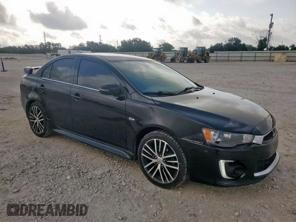 2016 Mitsubishi Lancer GT with VIN JA32U8FWXGU008597, listed as a Copart auction lot 59891435 with 131,632 mi miles and Salvage title. Bid and sale history available at DreamBid. Image 4.