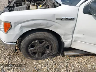 2014 Ford F-150 XL with VIN 1FTNF1CF6EKD16640, listed as a IAAI auction lot 40235032 with 124,116 mi miles and . Bid and sale history available at DreamBid. Image 6.