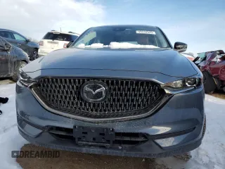 2021 Mazda CX-5 Touring with VIN JM3KFBCM0M0395988, listed as a Copart auction lot 45539925 with 39,889 mi miles and Salvage Title. Bid and sale history available at carsss.com. Image 5.