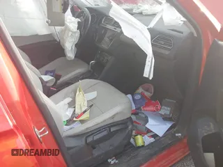 2018 Volkswagen Tiguan SEL z VIN 3VV3B7AX1JM208075, wystawiony jako IAAI lot #42651678 z przebiegiem Nie podano mil oraz . Historia ofert i sprzedaży dostępna na DreamBid. Obrazek 5.