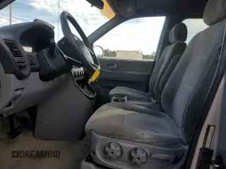 2005 Kia Sedona LX with VIN KNDUP132X56721558, listed as a Copart auction lot 88574685 with 176,660 mi miles and Salvage Title. Bid and sale history available at carsss.com. Image 7.