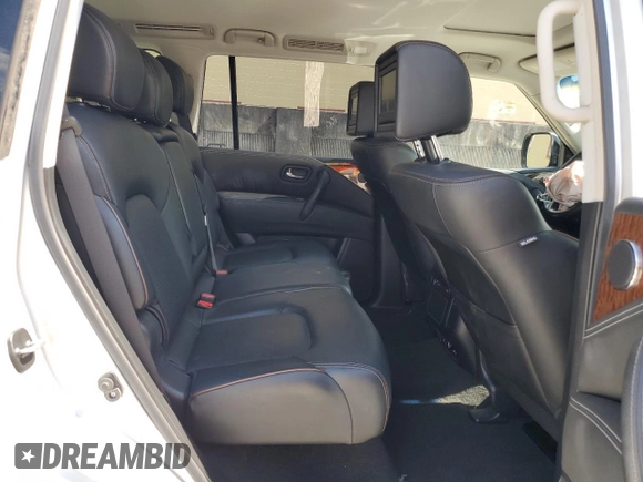 2017 Nissan Armada Platinum z VIN JN8AY2ND0H9008549, wystawiony jako Copart lot #56767515 z przebiegiem 60 152 mil mil oraz Szkoda całkowita • Salvage title. Historia ofert i sprzedaży dostępna na DreamBid. Obrazek 11.