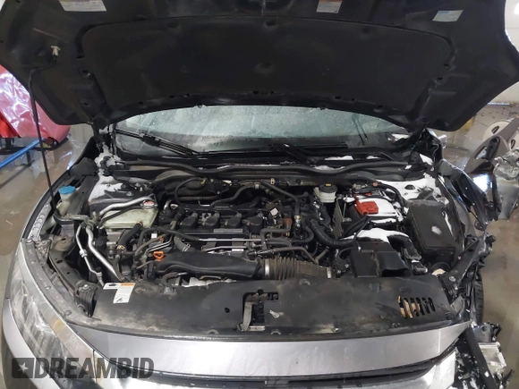 2018 Honda Civic EX-T with VIN JHMFC1F35JX031132, listed as a IAAI auction lot 41591028 with 111,087 mi miles and . Bid and sale history available at DreamBid. Image 10.