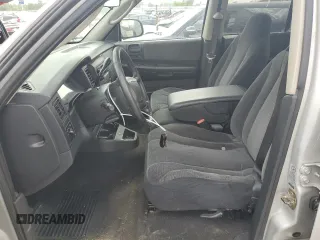 2004 Dodge Dakota Sport z VIN 1D7HG38K04S740136, wystawiony jako Copart lot #57356795 z przebiegiem 181 507 mil mil oraz Tytuł czysty. Historia ofert i sprzedaży dostępna na DreamBid. Obrazek 7.