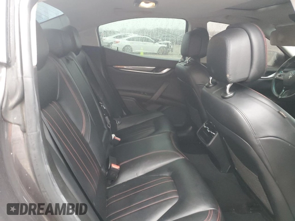 2016 Maserati Ghibli z VIN ZAM57XSA7G1168458, wystawiony jako Copart lot #43611465 z przebiegiem 98 110 mil mil oraz Szkody całkowita. Historia ofert i sprzedaży dostępna na DreamBid. Obrazek 10.