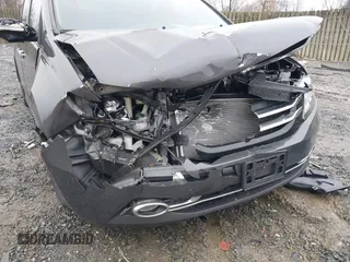 2015 Honda Odyssey Touring Elite with VIN 5FNRL5H92FB089627, listed as a IAAI auction lot 41115013 with Not Provided miles and . Bid and sale history available at DreamBid. Image 6.