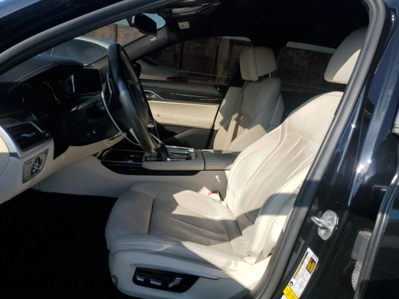 2016 BMW 7 Series 740i с VIN WBA7E2C54GG504200, выставлен на аукционе Copart как лот 46369885 с пробегом 70 606 миль миль и Списание • Salvage title. История ставок и продаж доступна на DreamBid. Изображение 7.