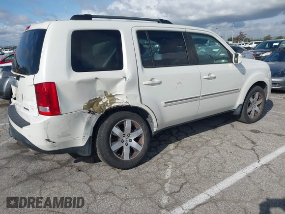 2015 Honda Pilot Touring with VIN 5FNYF3H93FB007766, listed as a IAAI auction lot 41932052 with 131,036 mi miles. Bid and sale history available at carsss.com. Image 4.